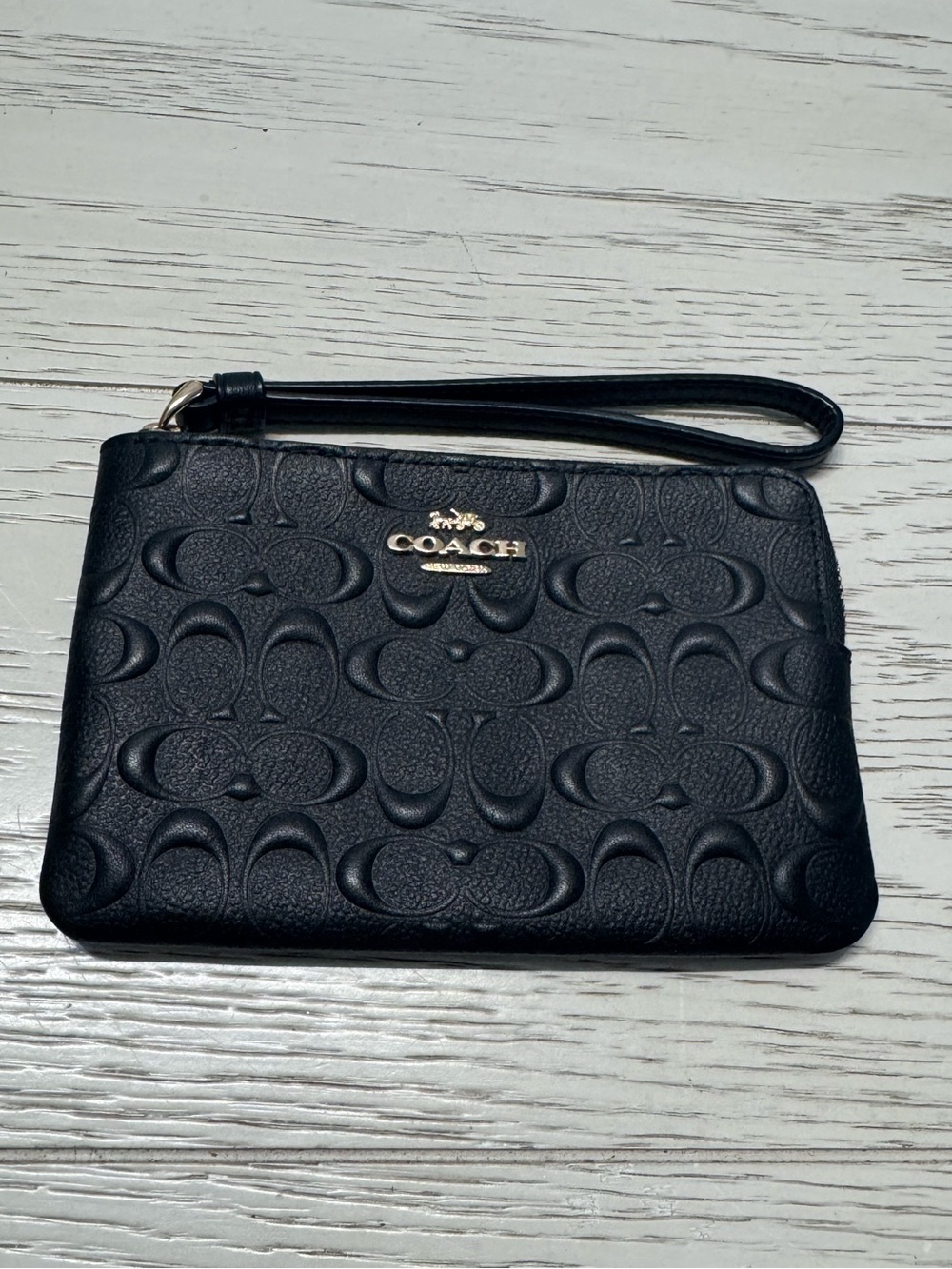 Coach Black Signature Embossed Wristlet with Gold Logo